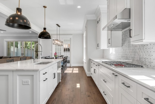 6900 Staghorn Ln, Raleigh, NC 27615 - kitchen with range hood, stainless steel gas stovetop, crown molding, backsplash, and recessed lighting