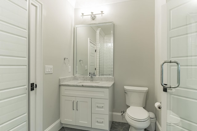 6900 Staghorn Ln, Raleigh, NC 27615 - bathroom featuring baseboards and vanity