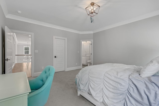 6900 Staghorn Ln, Raleigh, NC 27615 - bedroom featuring light carpet, ornamental molding, a chandelier, and ensuite bathroom