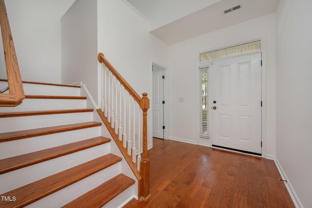 1016 Kingston Grove Dr, Cary, NC 27519 - foyer with wood finished floors and stairway