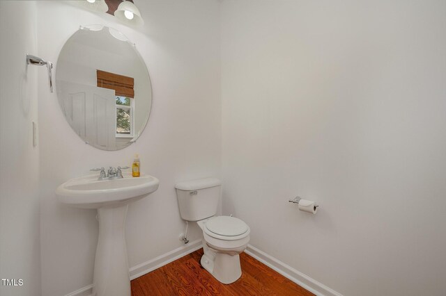 1016 Kingston Grove Dr, Cary, NC 27519 - bathroom with toilet and wood finished floors