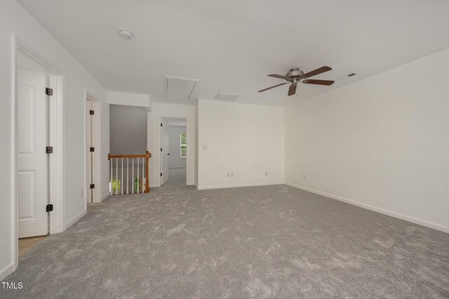 1016 Kingston Grove Dr, Cary, NC 27519 - empty room featuring ceiling fan, a smoke detector, carpet, and attic access