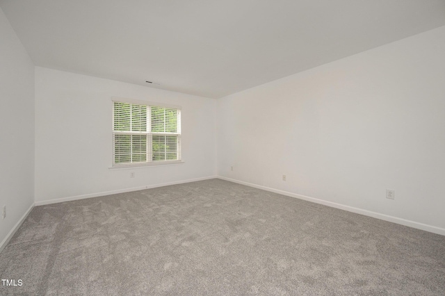 1016 Kingston Grove Dr, Cary, NC 27519 - carpeted spare room featuring baseboards