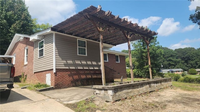 805 Perley St, Fayetteville, NC 28305 - view of home's exterior featuring a pergola and brick siding