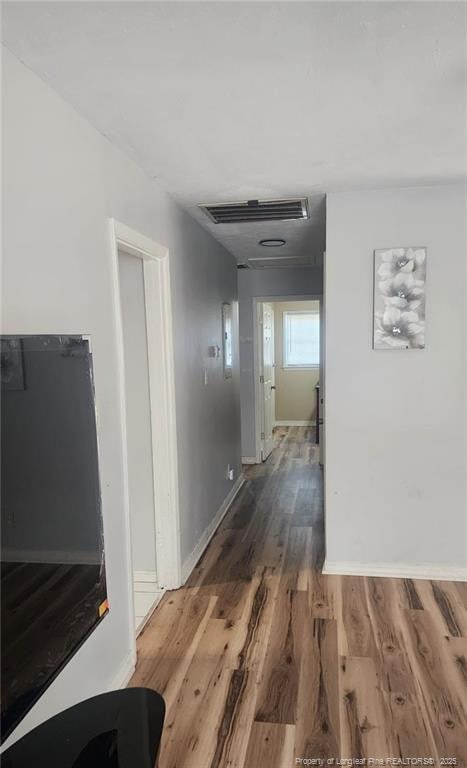 805 Perley St, Fayetteville, NC 28305 - corridor featuring wood finished floors and baseboards