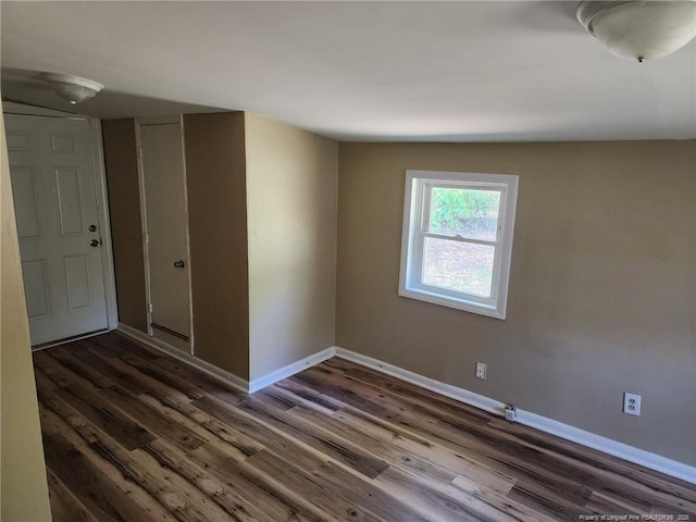 805 Perley St, Fayetteville, NC 28305 - unfurnished room with dark wood-style flooring and baseboards