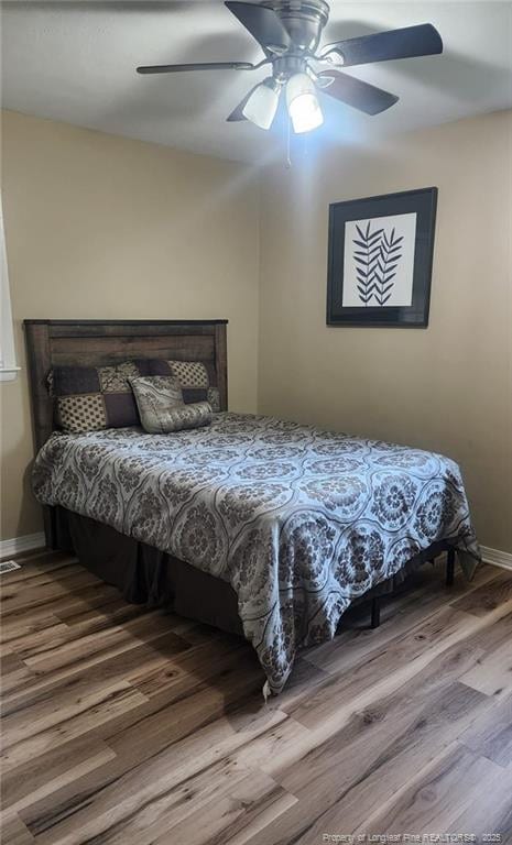 805 Perley St, Fayetteville, NC 28305 - bedroom featuring wood finished floors and ceiling fan