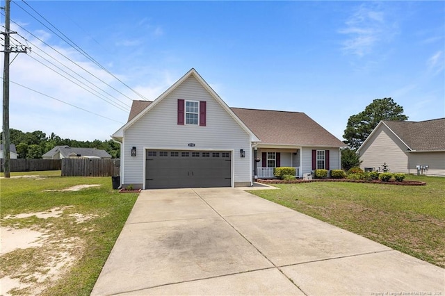 2720 Daniel Boone Ln, Hope Mills, NC 28348 - traditional-style house featuring concrete driveway, a garage, and covered porch