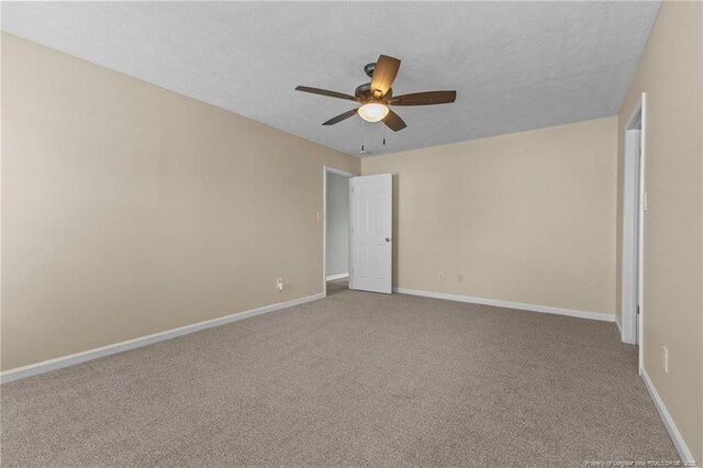 2720 Daniel Boone Ln, Hope Mills, NC 28348 - carpeted empty room featuring ceiling fan and baseboards