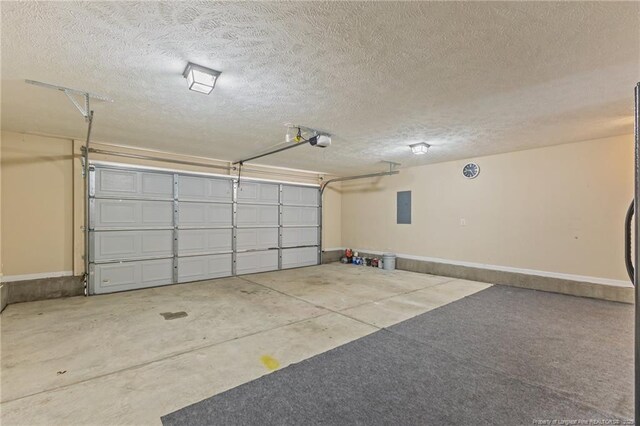 2720 Daniel Boone Ln, Hope Mills, NC 28348 - garage featuring a garage door opener and electric panel