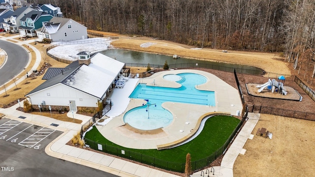 2346 Mckenzie Ridge Ln, Apex, NC 27502 - drone / aerial view of a pool area and a heavily wooded area