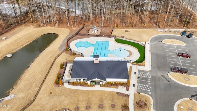 2346 Mckenzie Ridge Ln, Apex, NC 27502 - bird's eye view of a pool and a nearby body of water