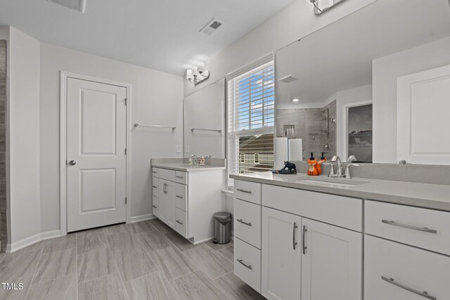 2346 Mckenzie Ridge Ln, Apex, NC 27502 - full bathroom with a stall shower and two vanities