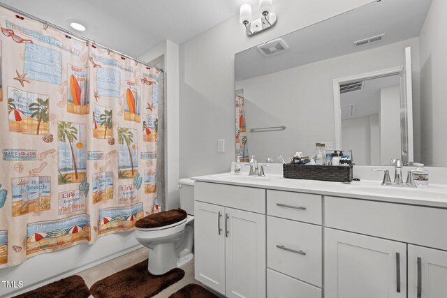 2346 Mckenzie Ridge Ln, Apex, NC 27502 - bathroom with double vanity and tile patterned floors