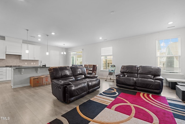 2346 Mckenzie Ridge Ln, Apex, NC 27502 - living area with light wood-type flooring and recessed lighting