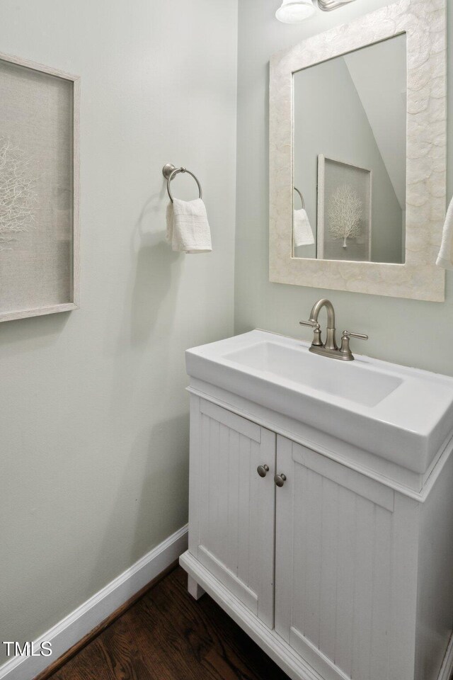 5809 N Hawthorne Way, Raleigh, NC 27603 - bathroom featuring vanity and wood finished floors