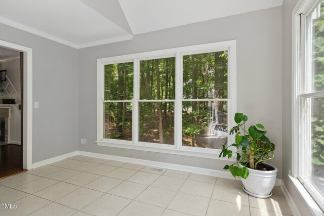 5809 N Hawthorne Way, Raleigh, NC 27603 - interior space featuring healthy amount of natural light, light tile patterned flooring, and ornamental molding
