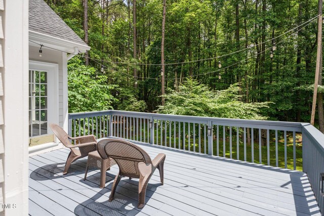 5809 N Hawthorne Way, Raleigh, NC 27603 - wooden terrace featuring a view of trees