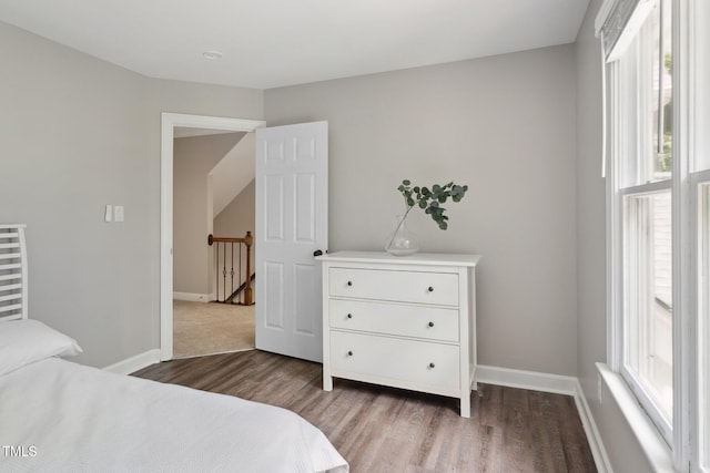5809 N Hawthorne Way, Raleigh, NC 27603 - bedroom with wood finished floors and baseboards