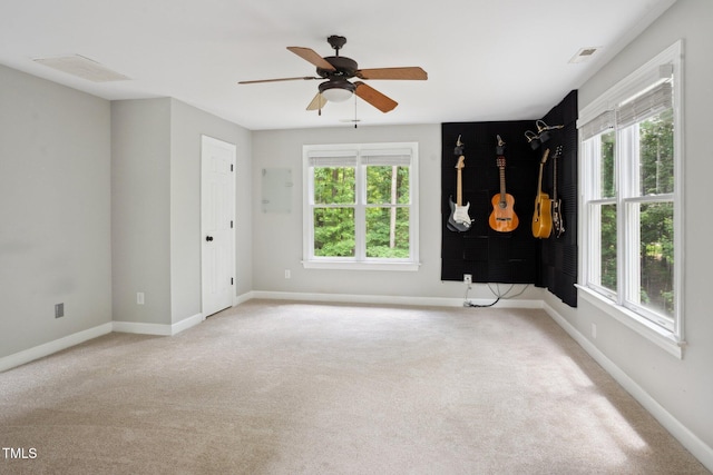5809 N Hawthorne Way, Raleigh, NC 27603 - carpeted spare room featuring healthy amount of natural light and ceiling fan