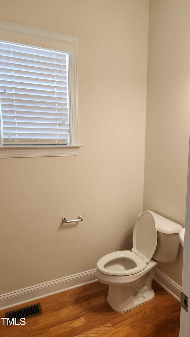 1016 Dotson Way, Apex, NC 27523 - bathroom with toilet and wood finished floors