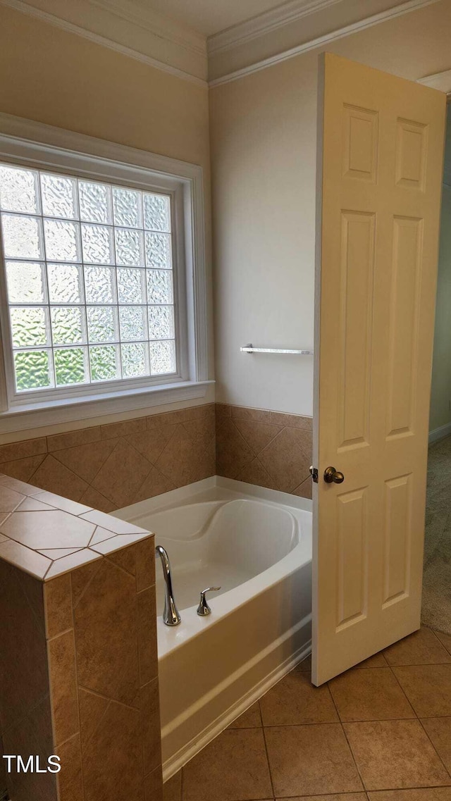 1016 Dotson Way, Apex, NC 27523 - full bath featuring a garden tub, ornamental molding, and tile patterned flooring