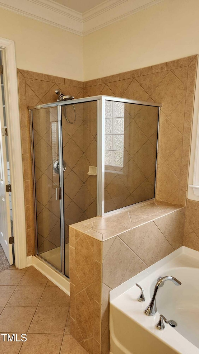 1016 Dotson Way, Apex, NC 27523 - full bathroom with a garden tub, ornamental molding, a stall shower, and tile patterned flooring