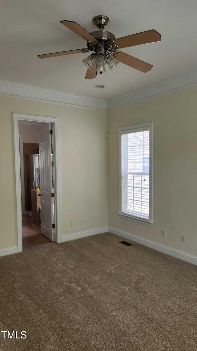 1016 Dotson Way, Apex, NC 27523 - empty room with crown molding, carpet, and a ceiling fan
