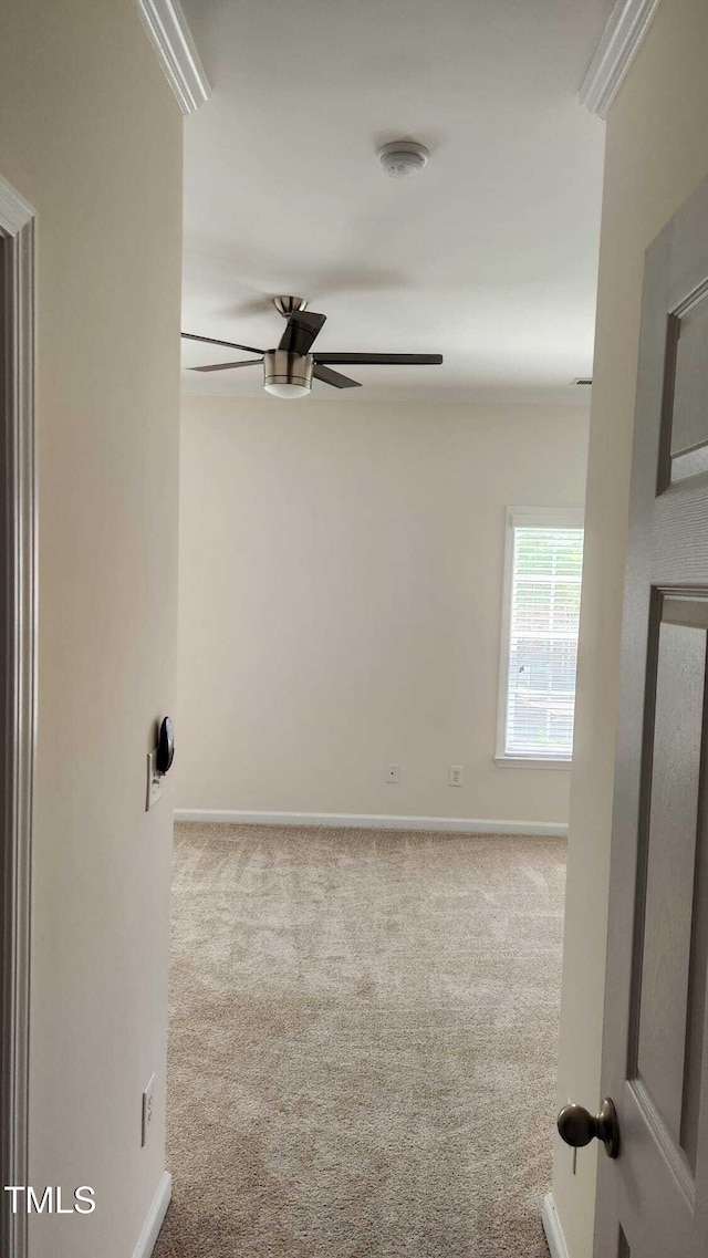 1016 Dotson Way, Apex, NC 27523 - spare room with ceiling fan, a smoke detector, and carpet