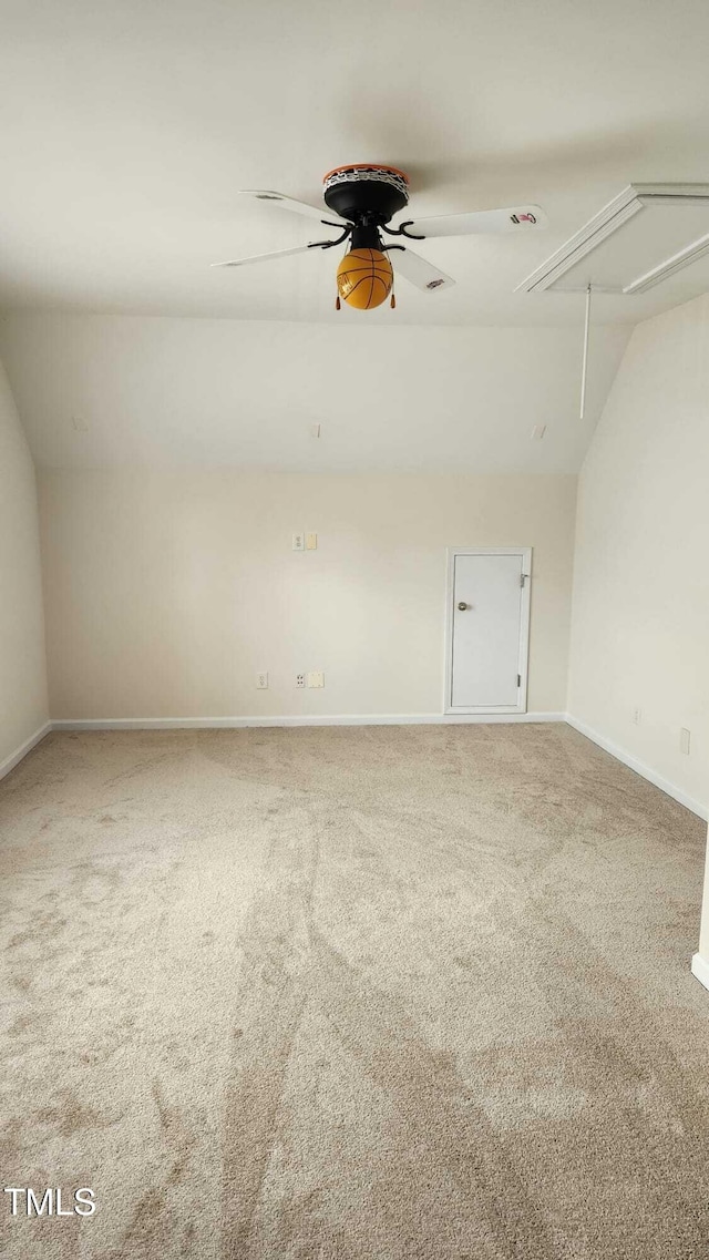 1016 Dotson Way, Apex, NC 27523 - carpeted empty room with attic access, lofted ceiling, and a ceiling fan