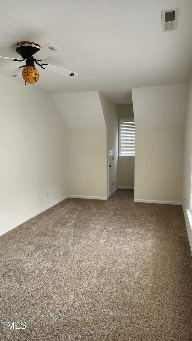 1016 Dotson Way, Apex, NC 27523 - additional living space featuring carpet, a ceiling fan, and vaulted ceiling