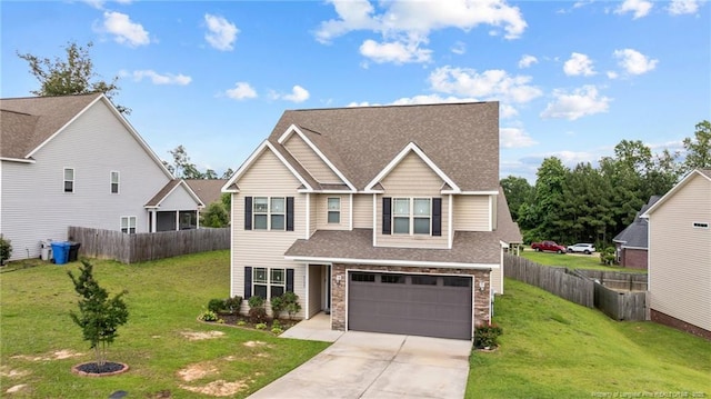 5135 Paul Peel Pl, Hope Mills, NC 28348 - view of front of property featuring concrete driveway, roof with shingles, a garage, and stone siding