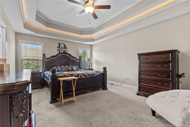 5135 Paul Peel Pl, Hope Mills, NC 28348 - bedroom with ornamental molding, light colored carpet, multiple windows, a tray ceiling, and a ceiling fan