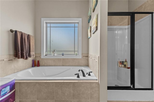 5135 Paul Peel Pl, Hope Mills, NC 28348 - bathroom with a stall shower, a bath, and plenty of natural light