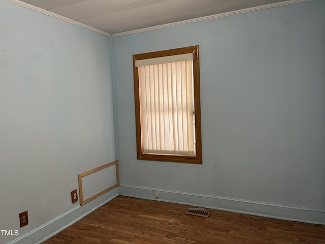 129 S Bullock St, Henderson, NC 27536 - unfurnished room featuring wood finished floors and crown molding