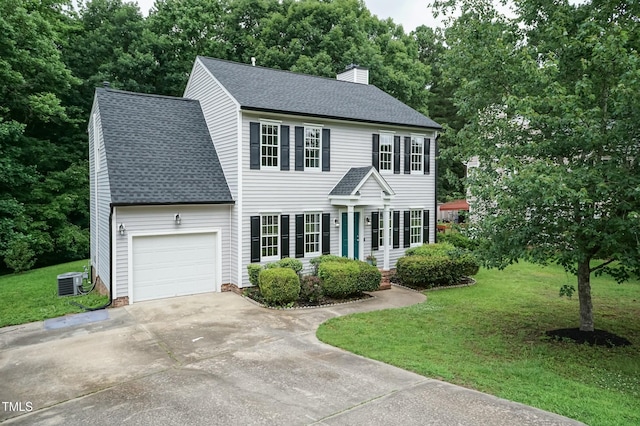 3110 Trinness Dr, Durham, NC 27707 - colonial inspired home featuring a shingled roof, an attached garage, and a front yard