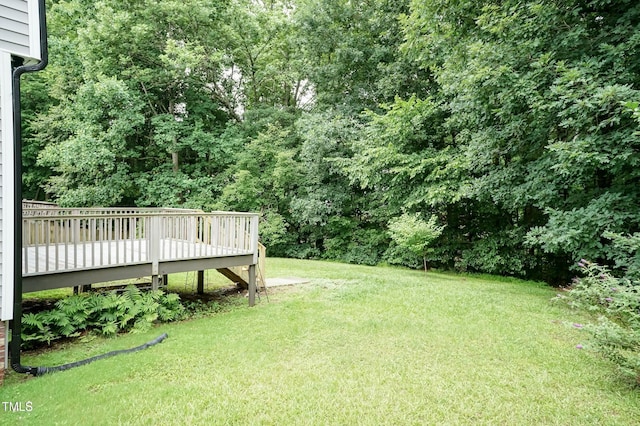 3110 Trinness Dr, Durham, NC 27707 - view of green lawn featuring a wooden deck