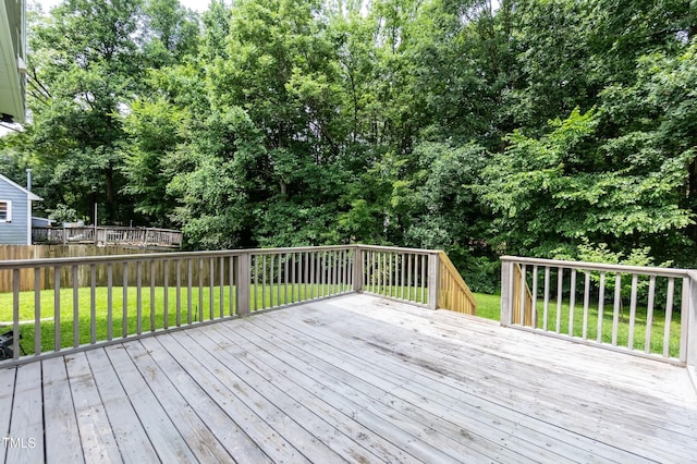 3110 Trinness Dr, Durham, NC 27707 - deck featuring a fenced backyard and view of wooded area