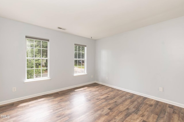 3110 Trinness Dr, Durham, NC 27707 - spare room with plenty of natural light and wood finished floors