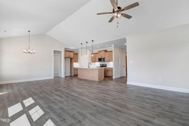 222 Cherrybirch Ln, Zebulon, NC 27597 - unfurnished living room featuring a chandelier, recessed lighting, ceiling fan, dark wood finished floors, and high vaulted ceiling
