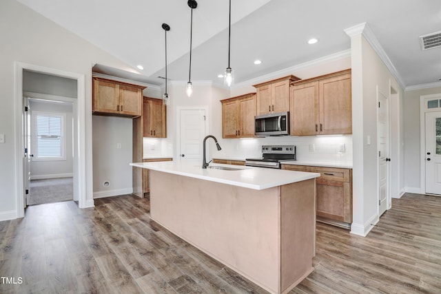 222 Cherrybirch Ln, Zebulon, NC 27597 - kitchen featuring appliances with stainless steel finishes, crown molding, backsplash, recessed lighting, and light wood-style floors