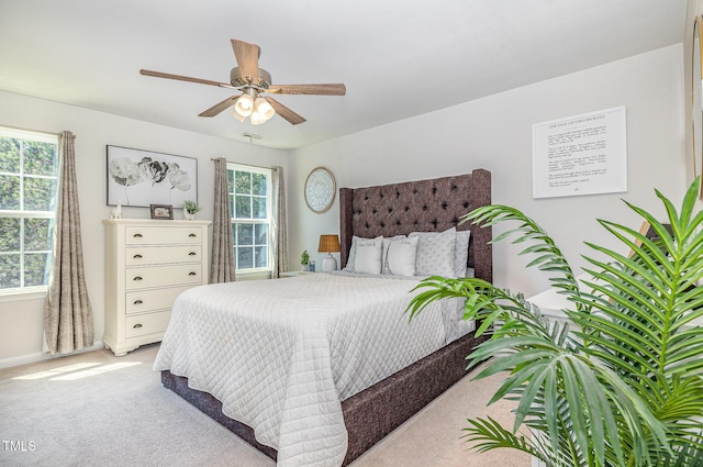 248 Amber Acorn Ave, Raleigh, NC 27603 - carpeted bedroom with ceiling fan and baseboards
