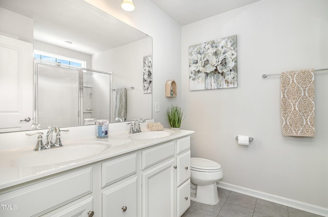 248 Amber Acorn Ave, Raleigh, NC 27603 - full bath featuring double vanity, tile patterned floors, and a stall shower