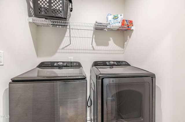 248 Amber Acorn Ave, Raleigh, NC 27603 - laundry room with washing machine and clothes dryer