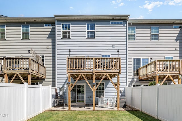 248 Amber Acorn Ave, Raleigh, NC 27603 - rear view of house with a patio area and a fenced backyard