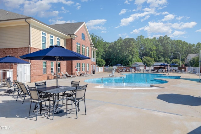 248 Amber Acorn Ave, Raleigh, NC 27603 - community pool with a patio