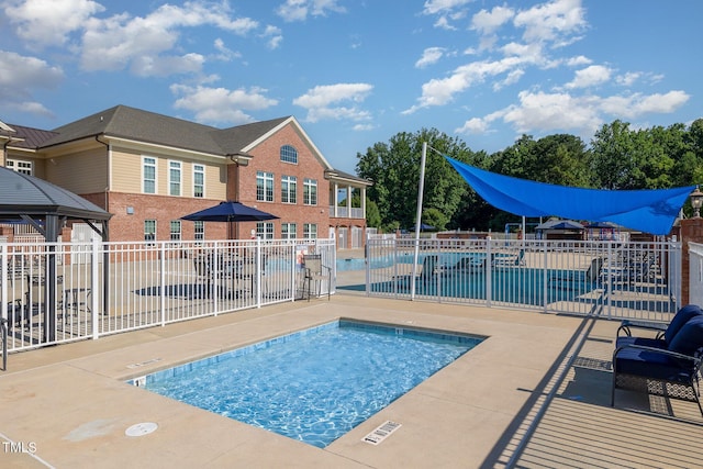 248 Amber Acorn Ave, Raleigh, NC 27603 - community pool featuring a gazebo and a patio