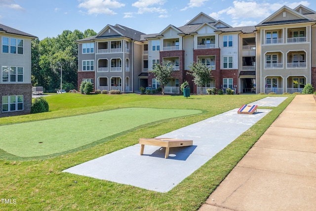 248 Amber Acorn Ave, Raleigh, NC 27603 - view of home's community with a putting area and a yard