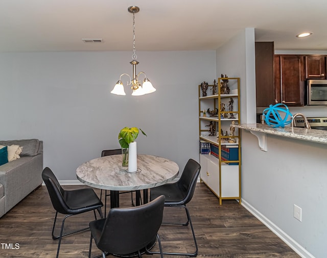 121 Longleaf Pine St, Clayton, NC 27527 - dining room featuring a chandelier, dark wood-style floors, and recessed lighting