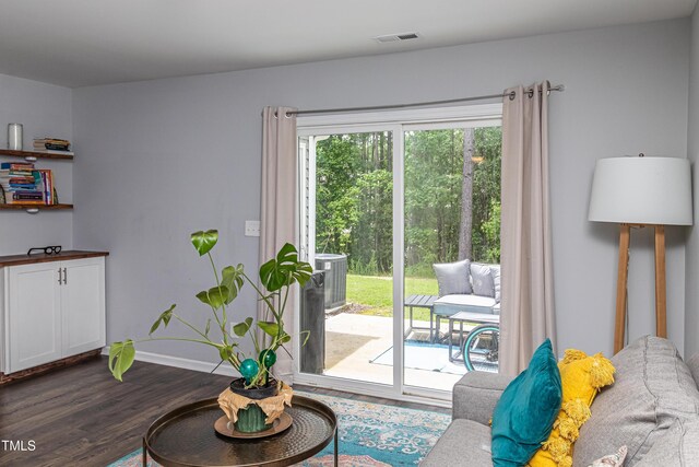 121 Longleaf Pine St, Clayton, NC 27527 - living room with dark wood-style flooring and baseboards